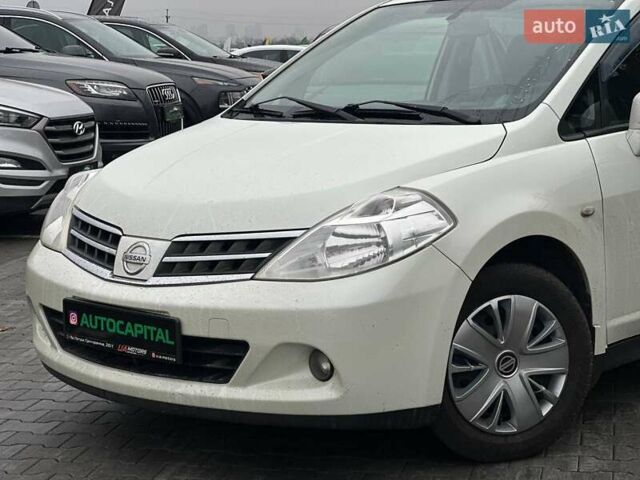 Белый Ниссан Тиида, объемом двигателя 1.5 л и пробегом 107 тыс. км за 7990 $, фото 2 на Automoto.ua