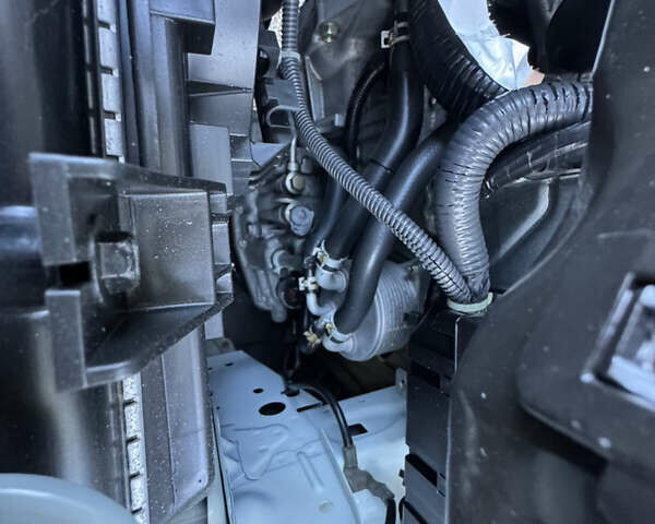 Белый Ниссан Тиида, объемом двигателя 1.5 л и пробегом 35 тыс. км за 8400 $, фото 21 на Automoto.ua