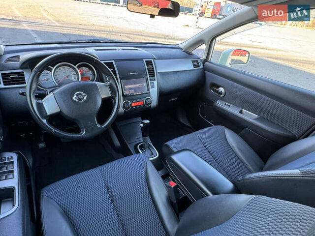 Белый Ниссан Тиида, объемом двигателя 1.5 л и пробегом 35 тыс. км за 8400 $, фото 8 на Automoto.ua