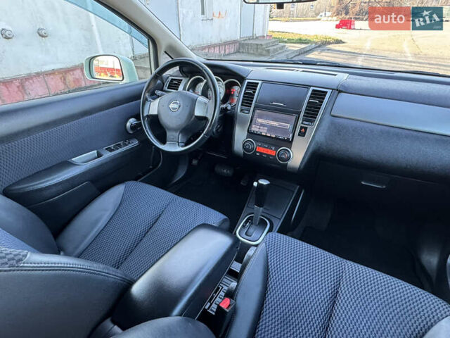 Белый Ниссан Тиида, объемом двигателя 1.5 л и пробегом 35 тыс. км за 8400 $, фото 11 на Automoto.ua