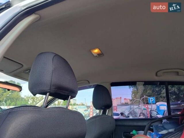 Білий Ніссан Тііда, об'ємом двигуна 1.6 л та пробігом 155 тис. км за 7200 $, фото 10 на Automoto.ua