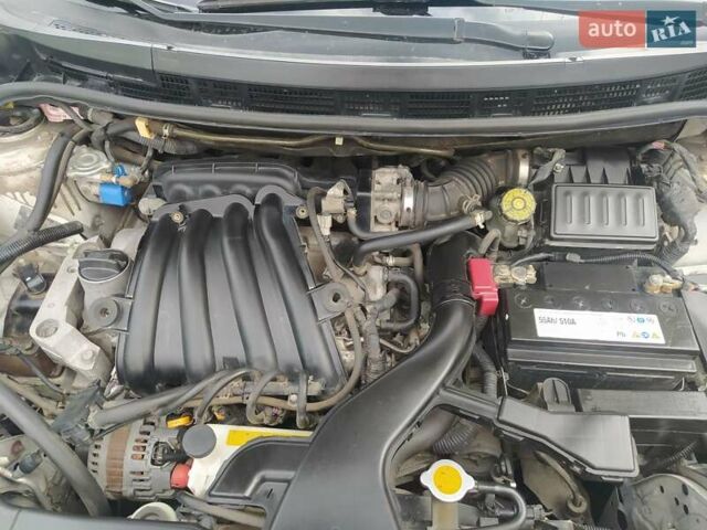 Белый Ниссан Тиида, объемом двигателя 1.6 л и пробегом 142 тыс. км за 6900 $, фото 24 на Automoto.ua