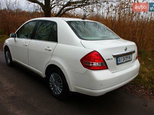 Белый Ниссан Тиида, объемом двигателя 1.6 л и пробегом 154 тыс. км за 5999 $, фото 8 на Automoto.ua