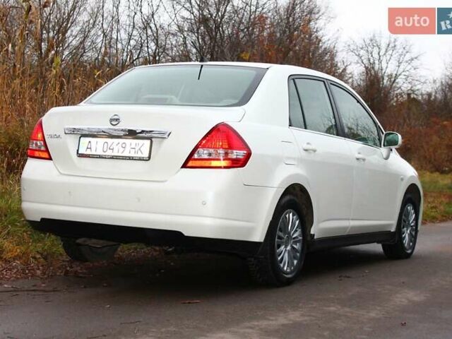 Білий Ніссан Тііда, об'ємом двигуна 1.6 л та пробігом 155 тис. км за 5900 $, фото 10 на Automoto.ua