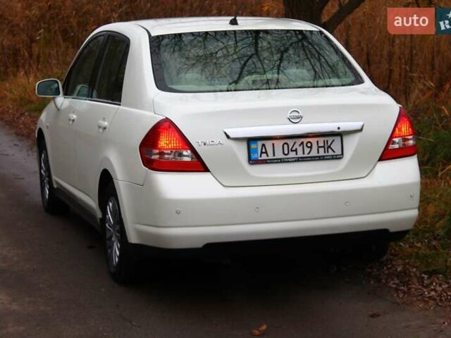Білий Ніссан Тііда, об'ємом двигуна 1.6 л та пробігом 155 тис. км за 5900 $, фото 9 на Automoto.ua