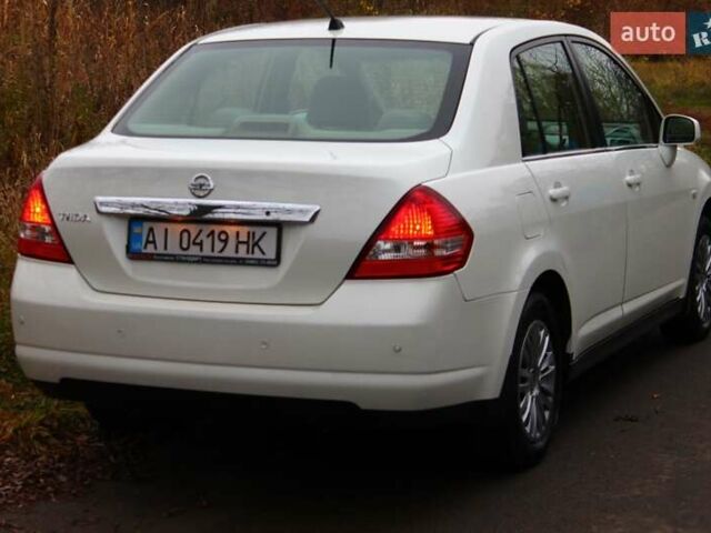 Білий Ніссан Тііда, об'ємом двигуна 1.6 л та пробігом 155 тис. км за 5900 $, фото 23 на Automoto.ua