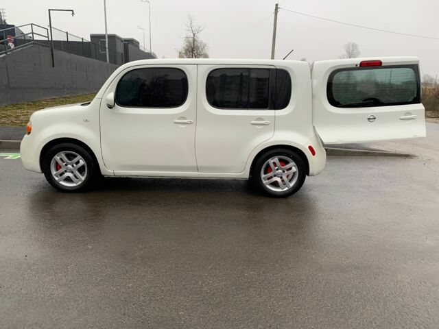 Белый Ниссан Тиида, объемом двигателя 1.8 л и пробегом 195 тыс. км за 6000 $, фото 4 на Automoto.ua