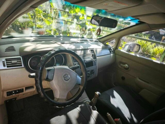 Бежевый Ниссан Тиида, объемом двигателя 1.6 л и пробегом 190 тыс. км за 4800 $, фото 7 на Automoto.ua