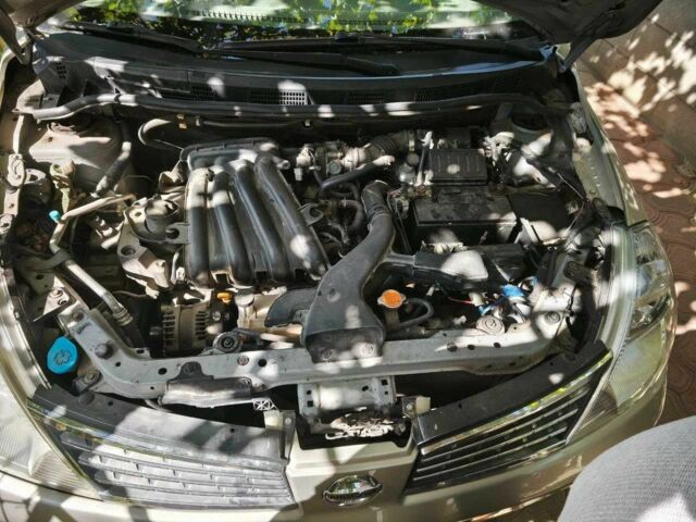 Бежевый Ниссан Тиида, объемом двигателя 1.6 л и пробегом 190 тыс. км за 4800 $, фото 5 на Automoto.ua