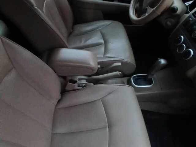 Бежевый Ниссан Тиида, объемом двигателя 1.6 л и пробегом 100 тыс. км за 5700 $, фото 5 на Automoto.ua