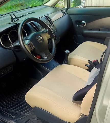 Бежевий Ніссан Тііда, об'ємом двигуна 1.6 л та пробігом 197 тис. км за 2900 $, фото 11 на Automoto.ua