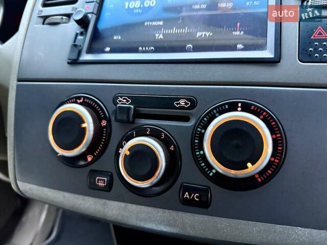 Бежевый Ниссан Тиида, объемом двигателя 1.6 л и пробегом 167 тыс. км за 4999 $, фото 43 на Automoto.ua