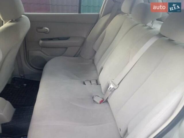 Бежевый Ниссан Тиида, объемом двигателя 1.6 л и пробегом 316 тыс. км за 4300 $, фото 7 на Automoto.ua