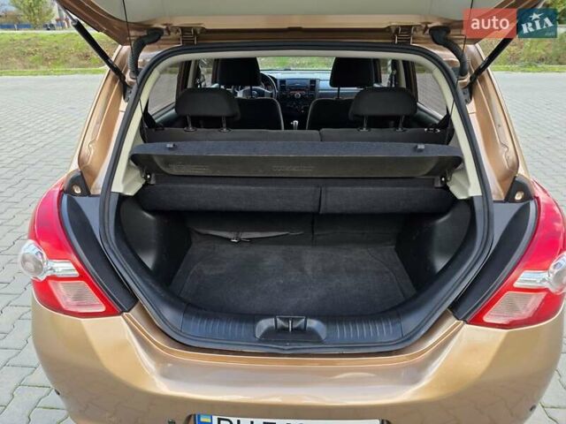Бежевый Ниссан Тиида, объемом двигателя 1.6 л и пробегом 62 тыс. км за 7900 $, фото 17 на Automoto.ua