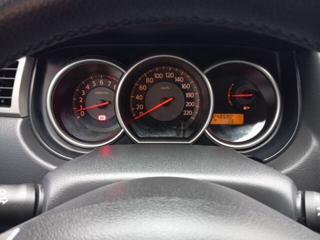 Бежевый Ниссан Тиида, объемом двигателя 1.8 л и пробегом 252 тыс. км за 6900 $, фото 3 на Automoto.ua