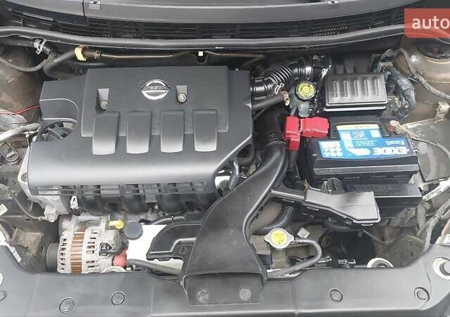 Бежевый Ниссан Тиида, объемом двигателя 1.6 л и пробегом 100 тыс. км за 6100 $, фото 19 на Automoto.ua