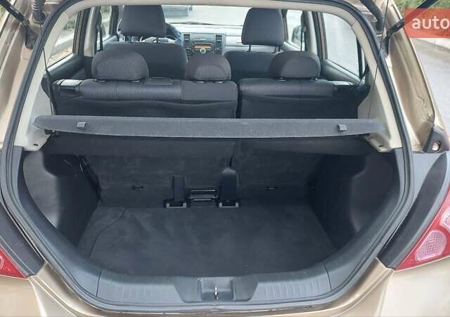 Бежевый Ниссан Тиида, объемом двигателя 1.6 л и пробегом 100 тыс. км за 6100 $, фото 11 на Automoto.ua