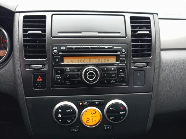 Бежевый Ниссан Тиида, объемом двигателя 1.8 л и пробегом 252 тыс. км за 6900 $, фото 6 на Automoto.ua