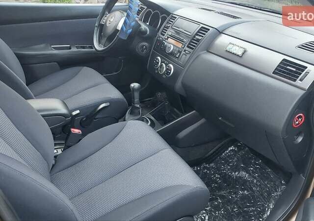 Бежевый Ниссан Тиида, объемом двигателя 1.6 л и пробегом 100 тыс. км за 6100 $, фото 10 на Automoto.ua