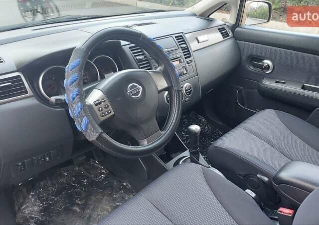 Бежевый Ниссан Тиида, объемом двигателя 1.6 л и пробегом 100 тыс. км за 6100 $, фото 16 на Automoto.ua