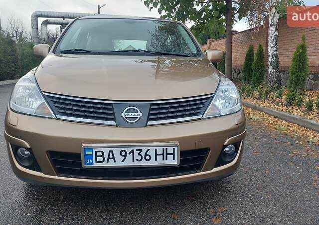 Бежевый Ниссан Тиида, объемом двигателя 1.6 л и пробегом 100 тыс. км за 6100 $, фото 4 на Automoto.ua