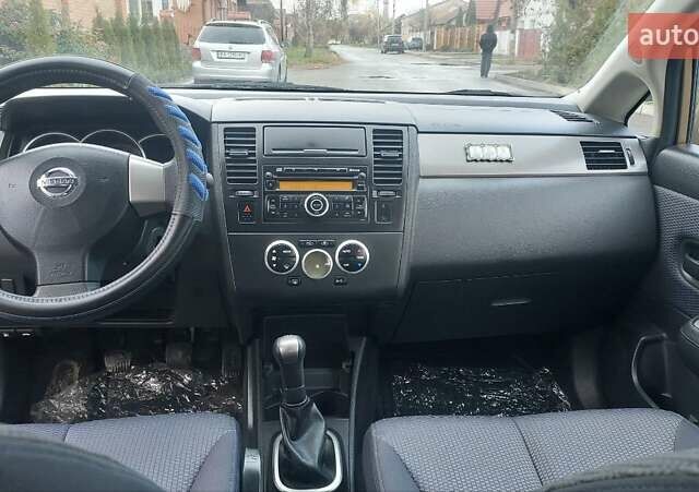 Бежевый Ниссан Тиида, объемом двигателя 1.6 л и пробегом 100 тыс. км за 6100 $, фото 13 на Automoto.ua