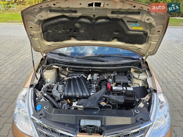 Бежевый Ниссан Тиида, объемом двигателя 1.6 л и пробегом 62 тыс. км за 7900 $, фото 15 на Automoto.ua