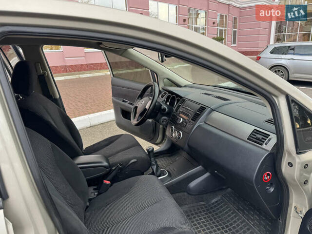 Бежевый Ниссан Тиида, объемом двигателя 1.6 л и пробегом 152 тыс. км за 6999 $, фото 24 на Automoto.ua