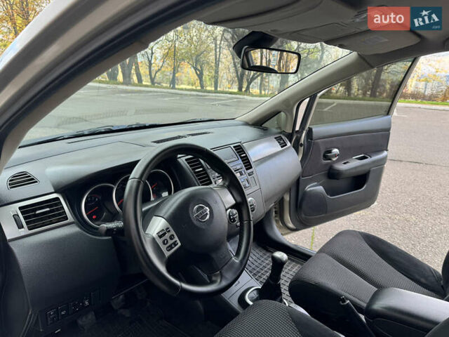 Бежевый Ниссан Тиида, объемом двигателя 1.6 л и пробегом 152 тыс. км за 6999 $, фото 27 на Automoto.ua