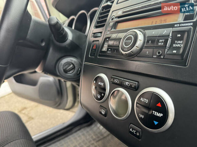 Бежевый Ниссан Тиида, объемом двигателя 1.6 л и пробегом 152 тыс. км за 6999 $, фото 22 на Automoto.ua