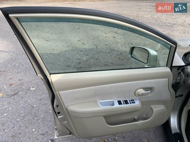 Бежевый Ниссан Тиида, объемом двигателя 1.5 л и пробегом 113 тыс. км за 7500 $, фото 41 на Automoto.ua