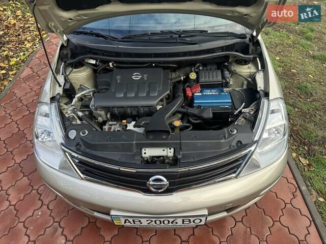 Бежевый Ниссан Тиида, объемом двигателя 1.6 л и пробегом 77 тыс. км за 7650 $, фото 43 на Automoto.ua
