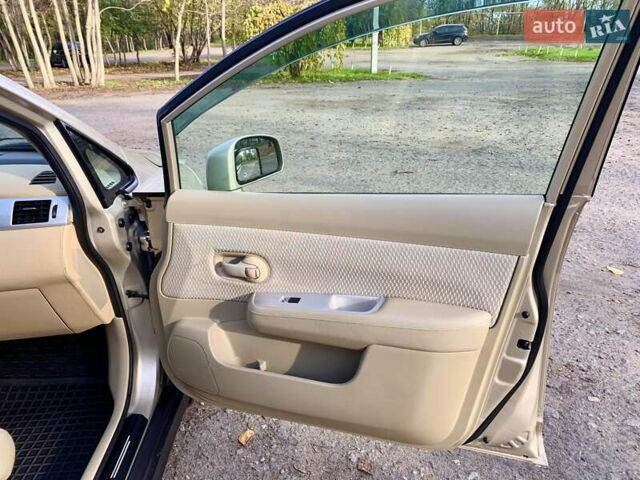 Бежевый Ниссан Тиида, объемом двигателя 1.5 л и пробегом 113 тыс. км за 7500 $, фото 22 на Automoto.ua