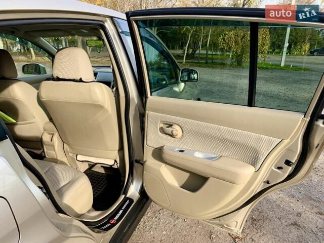 Бежевый Ниссан Тиида, объемом двигателя 1.5 л и пробегом 113 тыс. км за 7500 $, фото 25 на Automoto.ua