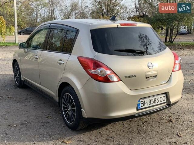 Бежевый Ниссан Тиида, объемом двигателя 1.5 л и пробегом 113 тыс. км за 7500 $, фото 44 на Automoto.ua