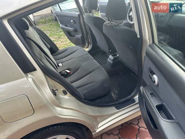 Бежевый Ниссан Тиида, объемом двигателя 1.6 л и пробегом 77 тыс. км за 7650 $, фото 28 на Automoto.ua