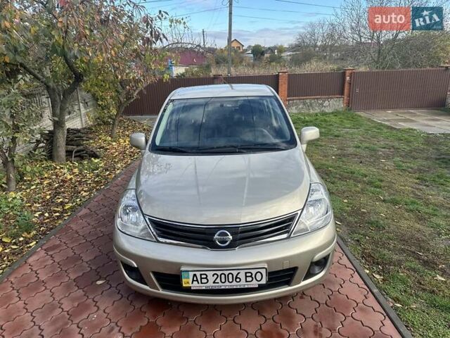 Бежевый Ниссан Тиида, объемом двигателя 1.6 л и пробегом 77 тыс. км за 7650 $, фото 11 на Automoto.ua