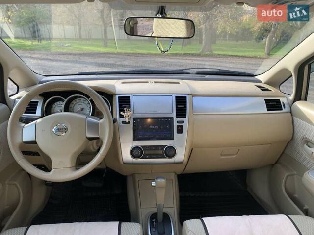 Бежевый Ниссан Тиида, объемом двигателя 1.5 л и пробегом 113 тыс. км за 7500 $, фото 8 на Automoto.ua