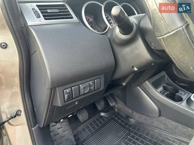 Бежевый Ниссан Тиида, объемом двигателя 1.6 л и пробегом 77 тыс. км за 7650 $, фото 16 на Automoto.ua