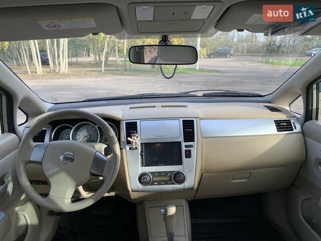 Бежевый Ниссан Тиида, объемом двигателя 1.5 л и пробегом 113 тыс. км за 7500 $, фото 46 на Automoto.ua