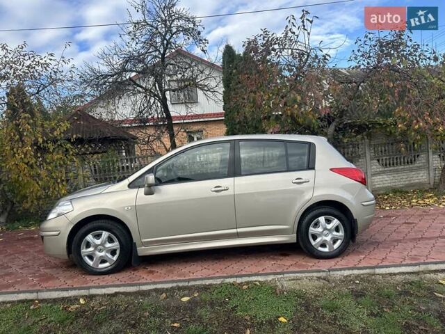 Бежевый Ниссан Тиида, объемом двигателя 1.6 л и пробегом 77 тыс. км за 7650 $, фото 3 на Automoto.ua