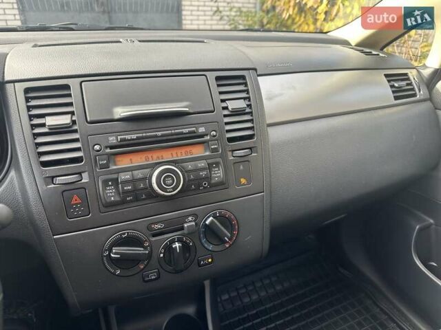 Бежевый Ниссан Тиида, объемом двигателя 1.6 л и пробегом 77 тыс. км за 7650 $, фото 40 на Automoto.ua