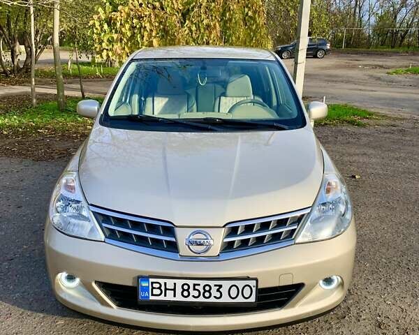 Бежевый Ниссан Тиида, объемом двигателя 1.5 л и пробегом 113 тыс. км за 7500 $, фото 3 на Automoto.ua