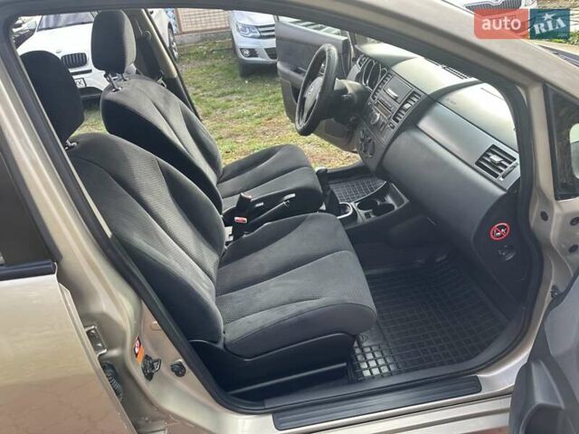 Бежевый Ниссан Тиида, объемом двигателя 1.6 л и пробегом 77 тыс. км за 7650 $, фото 25 на Automoto.ua