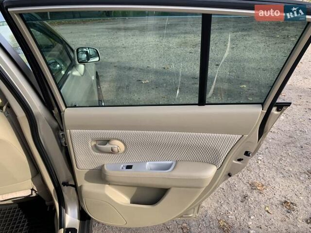 Бежевый Ниссан Тиида, объемом двигателя 1.5 л и пробегом 113 тыс. км за 7500 $, фото 54 на Automoto.ua