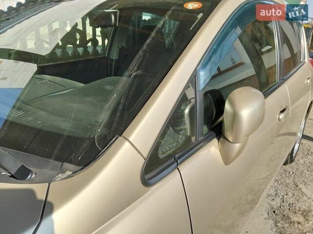 Бежевый Ниссан Тиида, объемом двигателя 1.5 л и пробегом 67 тыс. км за 8550 $, фото 4 на Automoto.ua