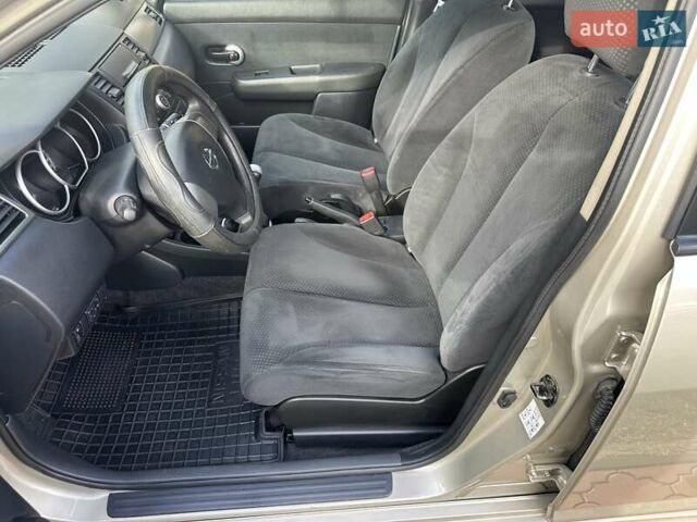 Бежевый Ниссан Тиида, объемом двигателя 1.6 л и пробегом 77 тыс. км за 7650 $, фото 17 на Automoto.ua