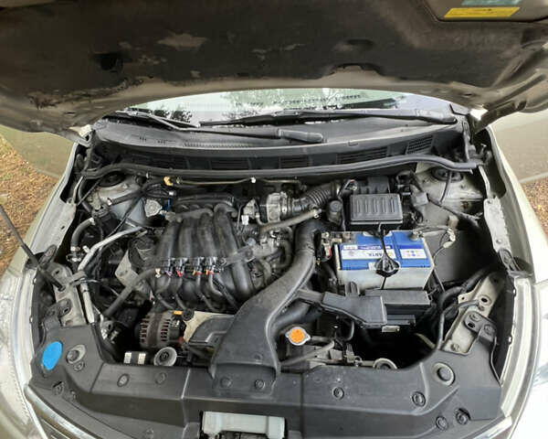 Бежевый Ниссан Тиида, объемом двигателя 1.6 л и пробегом 191 тыс. км за 5999 $, фото 18 на Automoto.ua