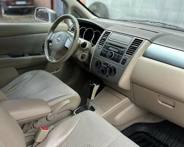 Бежевый Ниссан Тиида, объемом двигателя 1.6 л и пробегом 193 тыс. км за 4599 $, фото 41 на Automoto.ua