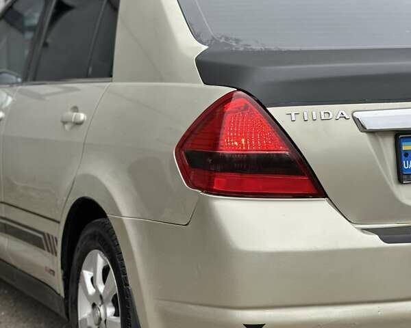 Бежевый Ниссан Тиида, объемом двигателя 1.6 л и пробегом 193 тыс. км за 4900 $, фото 22 на Automoto.ua